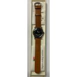 A gentleman's Tissot digital-analogue watch, black non-reflective dial, Arabic numerals, brown