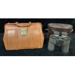 A ravel tan leather Gladstone type bag, brass clasp, 35cm wide; a pair of Chinon Countryman 10x 50