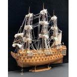 A model of a Spanish galleon, 85cm x 75cm, on stand