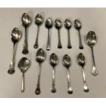 A set of six George V silver trefid teaspoons, London 1927, 95g; a pair of Liberty and Co. silver