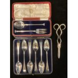 A pair of late Victorian silver grape shears, Sheffield 1899, 90g; a set of six Victorian silver