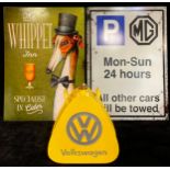 A triangular reproduction Volkswagen oil can, 34cm high; a humorous reproduction tin parking sign,
