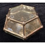 A Chelsom hexagonal brass ceiling light, seven bevelled glass panels enclosing three light fittings,