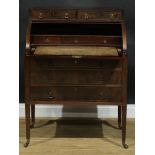 An early 20th century cylinder bureau, the superstructure with a pair of short drawers above a