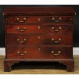 A ‘George III’ mahogany bachelor’s chest, later fold-over top above four long graduated cockbeaded