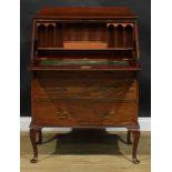 An early 20th century mahogany bureau, fall front quarter-veneered and centred by a flame-figured