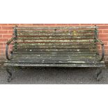 A scroll end garden bench, 81cm high, 150cm length