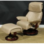 An Ekornes Stressless chair, 105cm high, 86cm wide, the seat 52cm wide and 48cm deep; a conforming