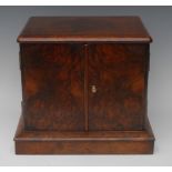 A Victorian burr walnut table cabinet or humidor, slightly oversailing rounded rectangular top above