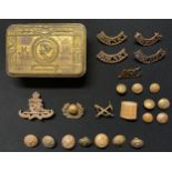 WW1 British Princess Mary's Gift Tin along with a pair of Dorset Regt brass shoulder titles and