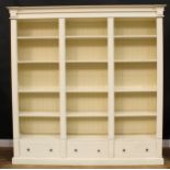 A substantial contemporary open bookcase, 210.5cm high, 209cm wide, 41cm deep