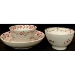 A Newhall tea bowl and saucer, ribbon and rose border, c.1790; another tea bowl