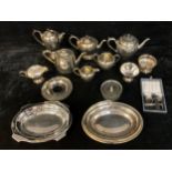 Plated Ware - a four piece plated tea service; another, three piece service; other early 20th