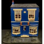 Toys & Juvenalia - a contemporary constructed wooden dolls house, the ground floor decorated with