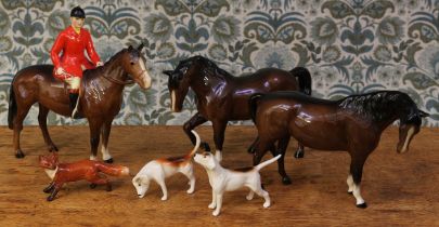 Beswick hunting group, comprising Huntsman, two Hounds and a Fox; two Beswick Horses in brown