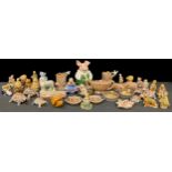 A quantity of Wade novelties including piggy bank, tortoises, blow-up nursery rhyme Whimsies,