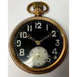 A gold plated open face pocket watch, black non-reflective dial, Arabic numerals in white,