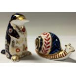 A Royal Crown Derby paperweight, Duckbilled Platypus, silver stopper; another, Snail, silver stopper