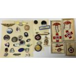 A collection of enamel badges including Red Cross medals and badges; etc, qty