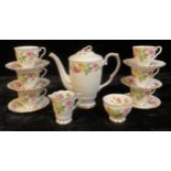 A Royal Staffordshire Tea Rose pattern coffee set for six comprising coffee pot, cream jug, sugar