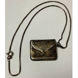 A Sterling silver envelope stamp case on neckchain