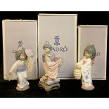 A Lladro Geisha figure, Michico, number 01447, boxed; two others, Oriental Dance, number 06230 and