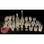 A Victorian cranberry glass fancy bowl, clear glass frill, c.1880; cut glass wine glasses, brandy