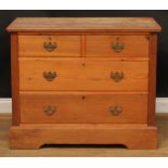 An early 20th century pine chest, of two short and two long drawers, 82cm high, 102cm wide, 52cm