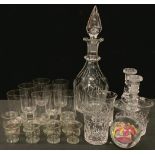 A 19th century cut glass decanter and stopper, 35cm; seven early 20th century glass beakers, star