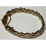 A 9ct gold fancy link bracelet, safety chain, marked 375, 13.4g