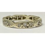A 9ct white gold eternity ring, set with clear stones, size L/M, marked 375, 2.2g, boxed