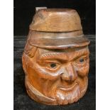 A Black Forest ‘toby jug’ novelty tobacco jar, as the head of a gentleman wearing a hat, early