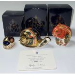 A Royal Crown Derby paperweight, Red Squirrel, gold stopper, boxed; others, Garden Snail, limited