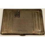 A continental silver rounded rectangular cigarette case, engine turned, applied with a monogram,