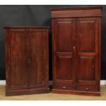 A contemporary hardwood press cabinet, outswept cornice above a pair of raised and fielded panel