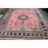 A substantial woollen carpet, 447cm x 374cm