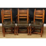 A set of six oak dining chairs, comprising five side chairs and a carver, the side chair 97cm