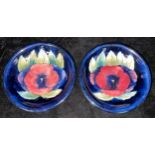 A pair of Moorcroft Pansy pattern dishes, 19cm diameter