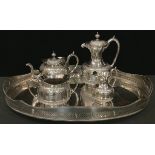 A Victorian four piece EPBM tea service, by James Deakin; a silver plated gallery tray (5)