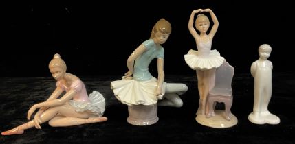A Lladro model of a ballerina, two Leonardo ballerina figures; a Royal Doulton figure, The Kiss