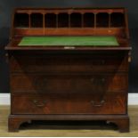 A George III Revival bureau, 106.5cm high, 106cm wide, 55.5cm deep