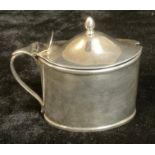 A George IV silver oval tankard mustard pot, hinged cover, blue glass liner, knop finial,