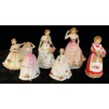 A Royal Doulton Royal Albert figure, Old Country Rose, Sweet Rose RA26; another, Old Country Rose