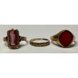 A 9ct gold signet ring, set with a single carnelian, size S, 3.8g; an unmarked gold cameo ring, size