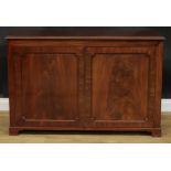 A Regency design mahogany side cabinet, rectangular top above a pair of panel doors enclosing two