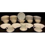 A set of four Sophie Conran for Portmeirion shell shaped white glazed serving dishes, pair of coffee
