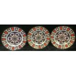 A set of three Royal Crown Derby 1128 pattern plates, 27cm, first quality