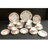 A Colclough Honeysuckle pattern tea set, cups saucers, milk and sugar, sandwich plate, pattern