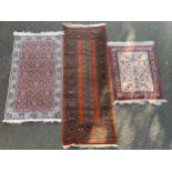 Carpets & Rugs - a runner, 150cm x 72cm; two others similar, 65cm x 200cm and 65cm x 100cm (3)