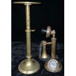 A contemporary brass candlestick telephone; an early 20th century adjustable brass stand, possibly